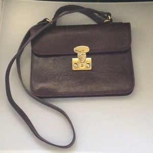 Furla vintage handbag, Plum leather, signs of wear on the inside.
